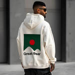 Bangladesh man wears luxury oversized off white hoodie with image of the Great Bear logo and the Ireland green and red Bangladesh flag embroidered onto the back