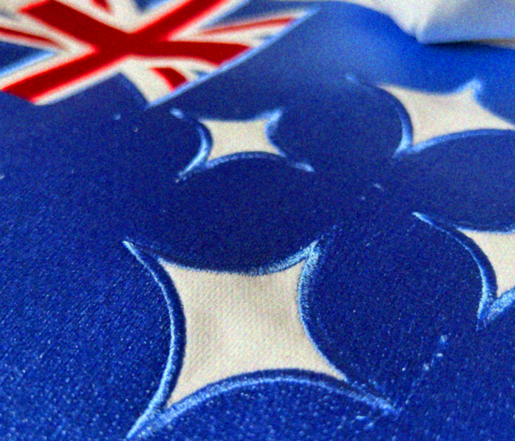 Close up of precise embroidery of Australian flag on luxury oversized hoodie